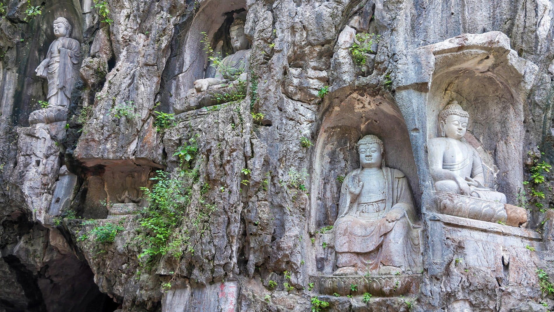 The Peak That Flew From Afar & Buddhism~The Peak That Flew From Afar is a limestone rock face decorated with 492 exquisite Buddhist statues, lining the walkway to Lingyin temple, founded in the fourth century.