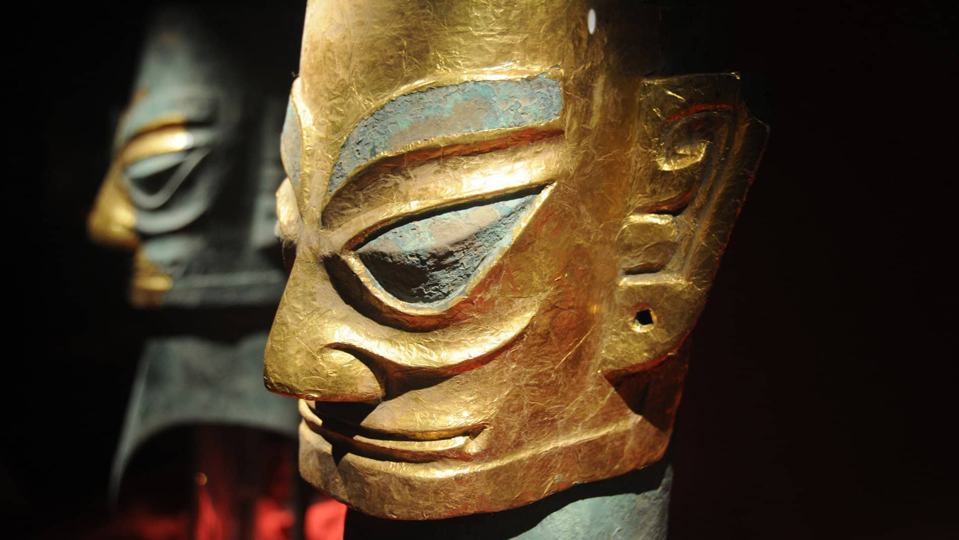 Sanxingdui~Excavated in 1986, the burial pits at Sanxingdui disgorged an amazing treasure trove of golden scepters, gold masks from the size of your pinky to the width of a table and 20 feet tall bronze trees of life; all about three thousand years old.