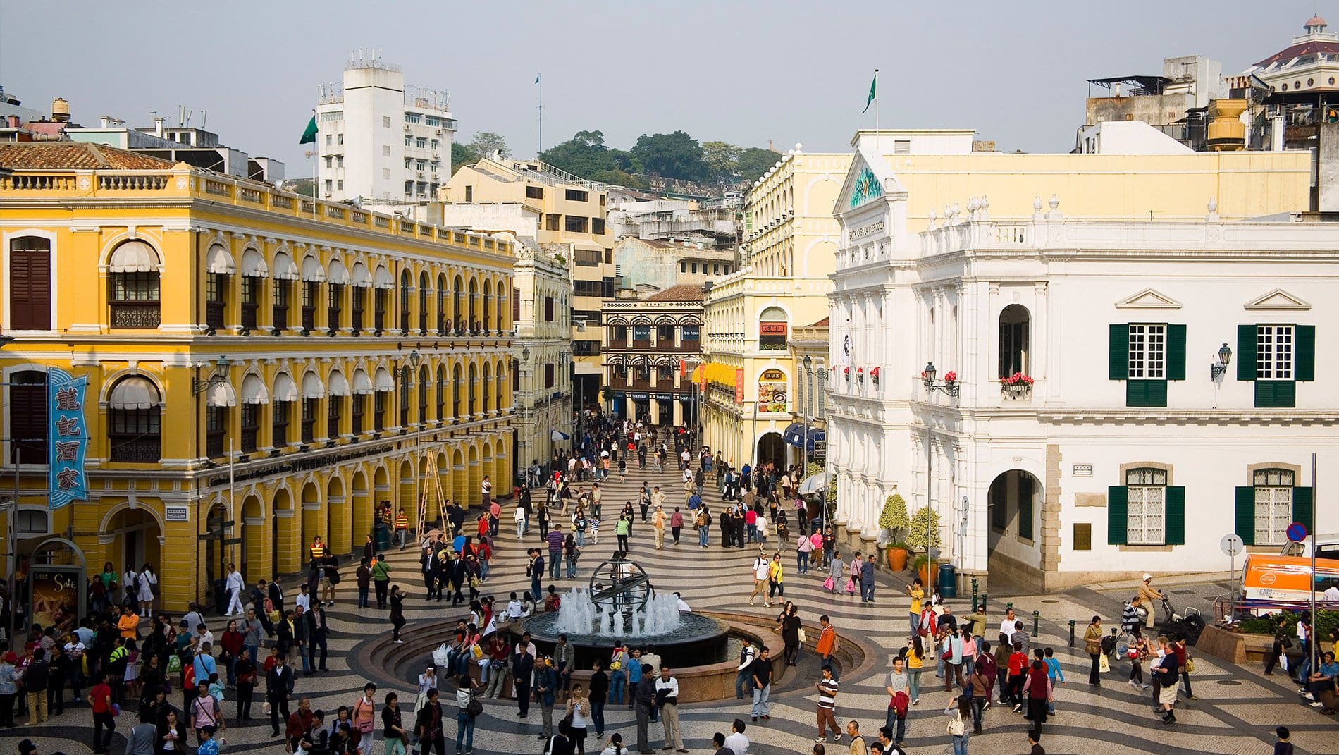 Senado Square~What's most interesting culturally about Macao is how a Portuguese colony adapted to its Asian circumstances. Whilst the Jesuits incorporated Confucian rites within Catholicism to pursue converts, opium dens spread through the colony.