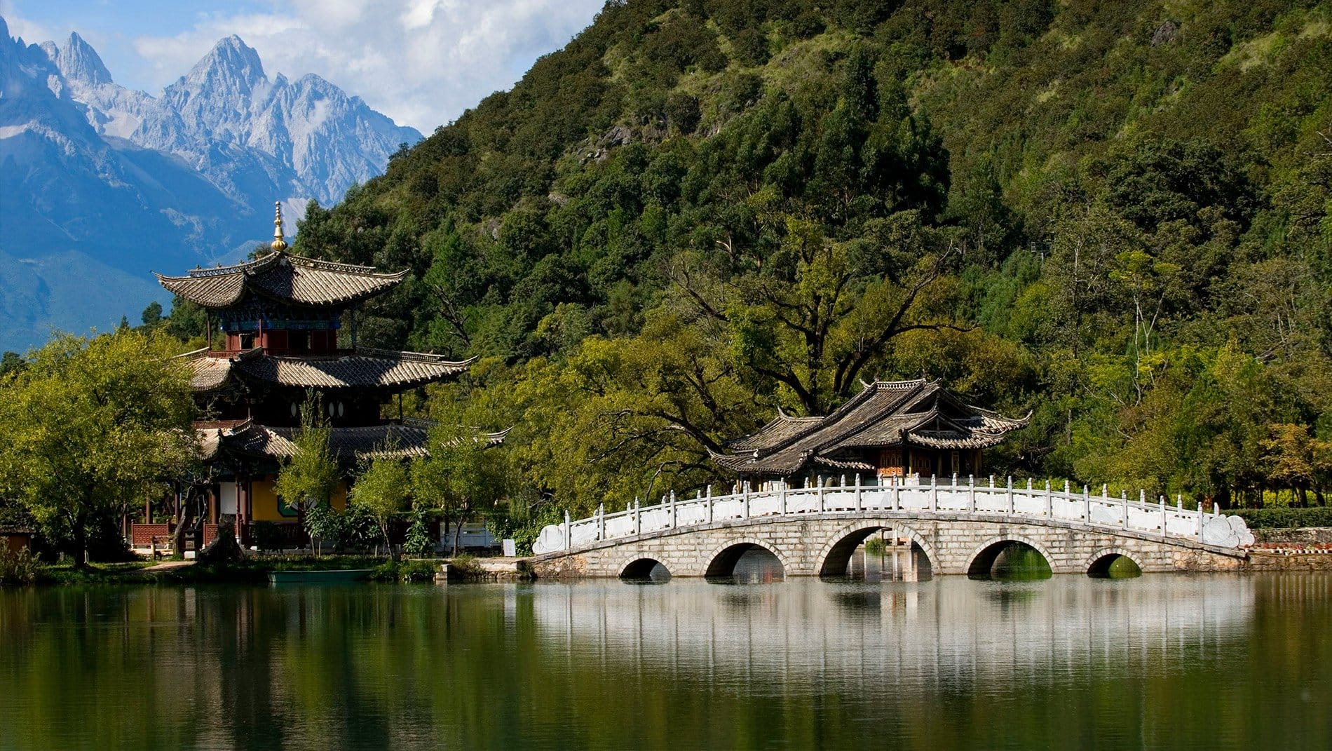 Jade Dragon Snow Mountain~The melting glacier overlooking Lijiang is the source of its freshwater and also a symbol of the challenging terrain of the Tea and Horse trade route on which Lijiang traditionally relied for its income.